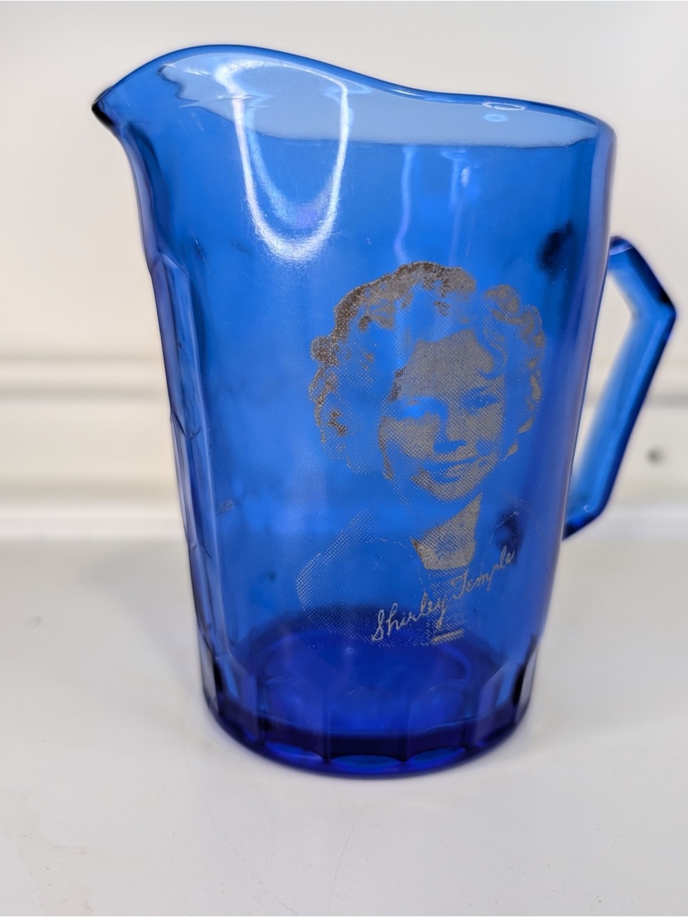 VTG Shirley Temple Cobalt Blue Glass Pitcher with Etched Portrait 4.5”